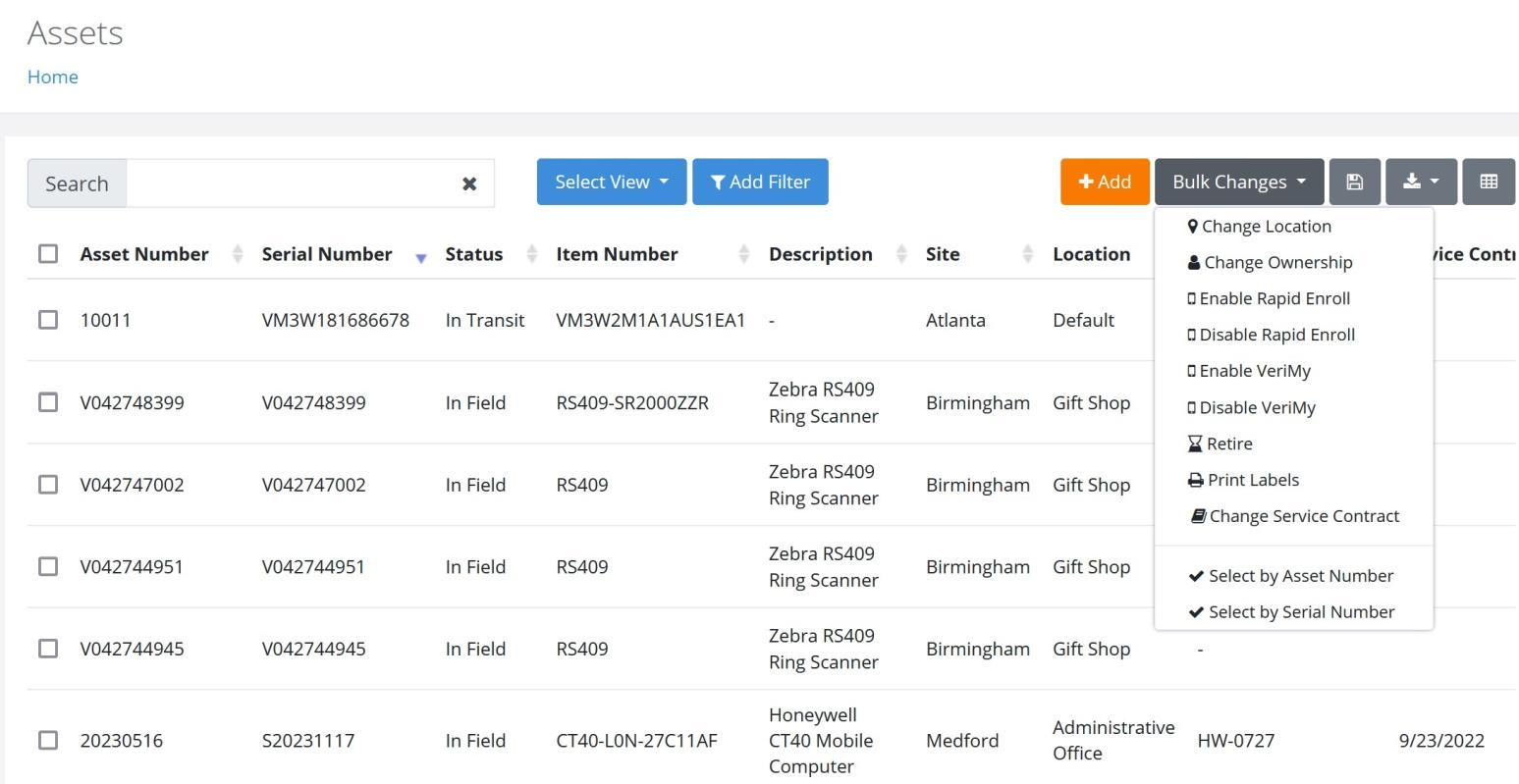 Assets page with the Bulk Changes menu showing Select by Asset Number and Select by Serial Number